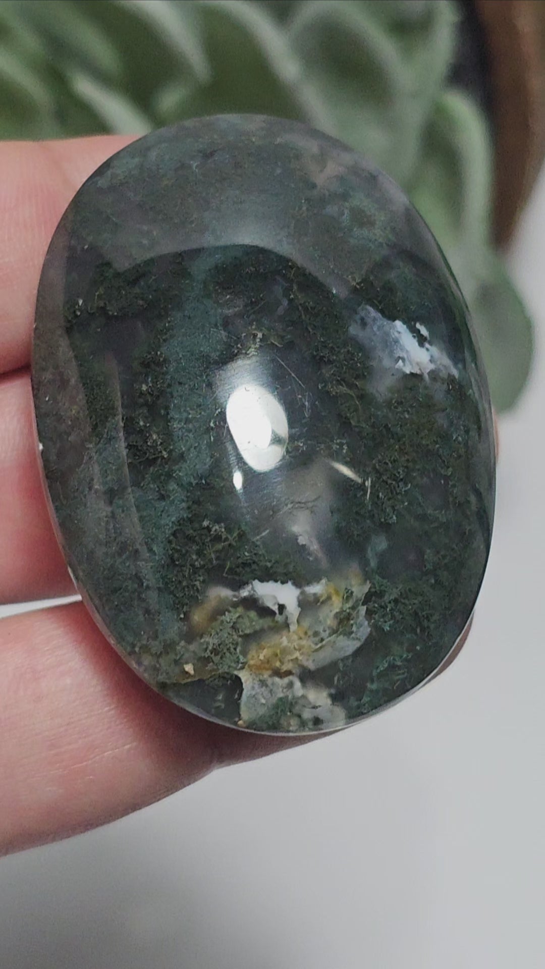 Beautiful forest green and earthy golden brown Moss Agate palm stone from Indonesia