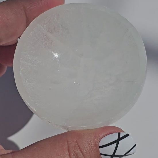 A small Selenite round dish perfect for cleansing your mini crystals.