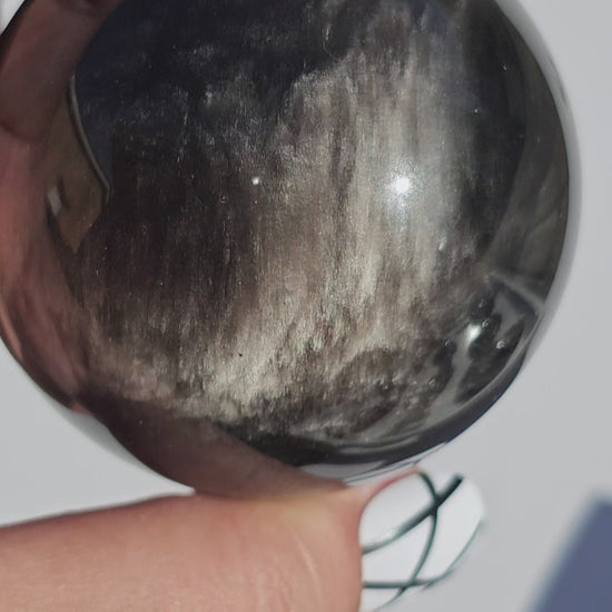 Black Obsidian sphere with an alluring sheen of Silver.