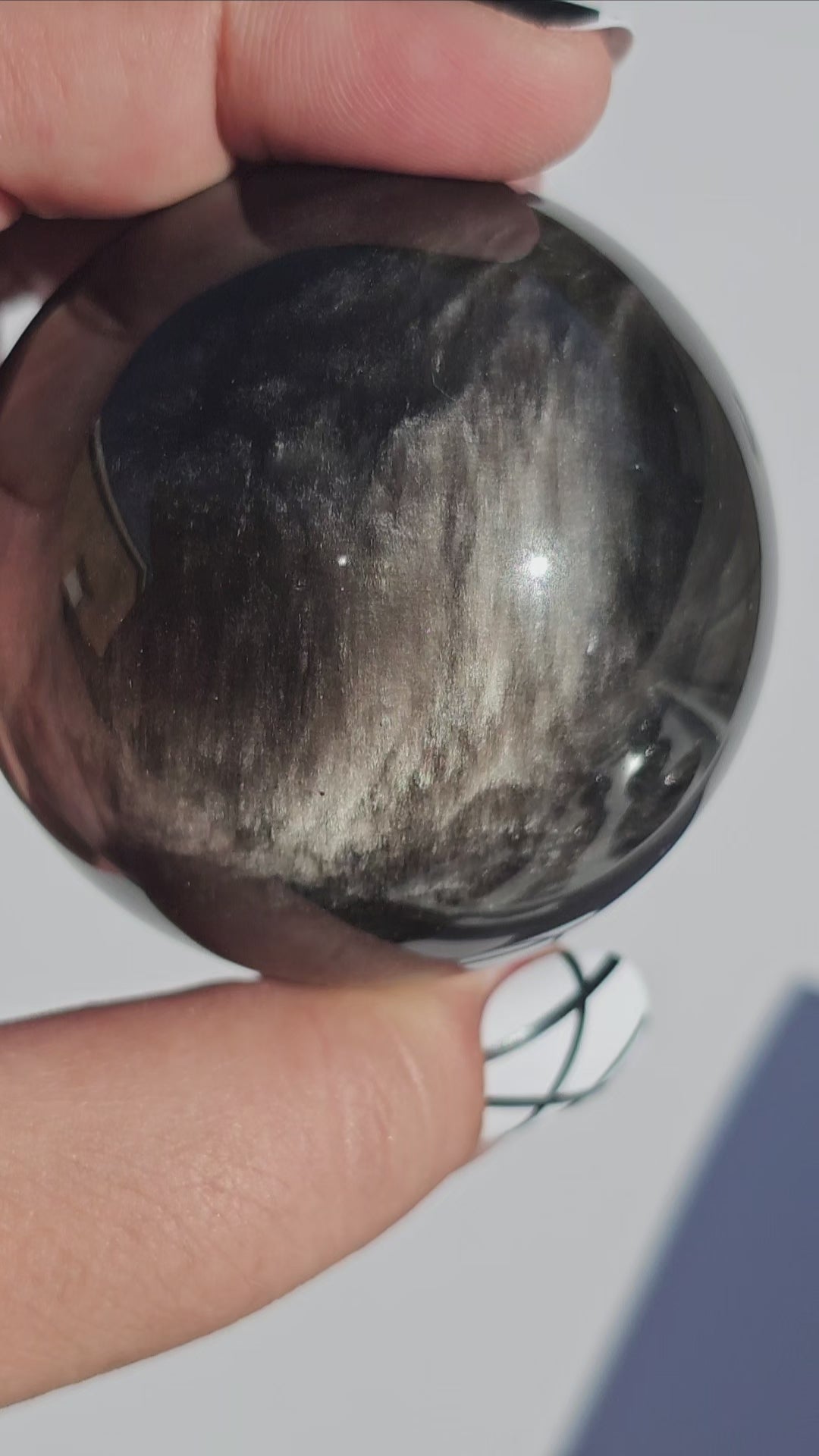 Black Obsidian sphere with an alluring sheen of Silver.