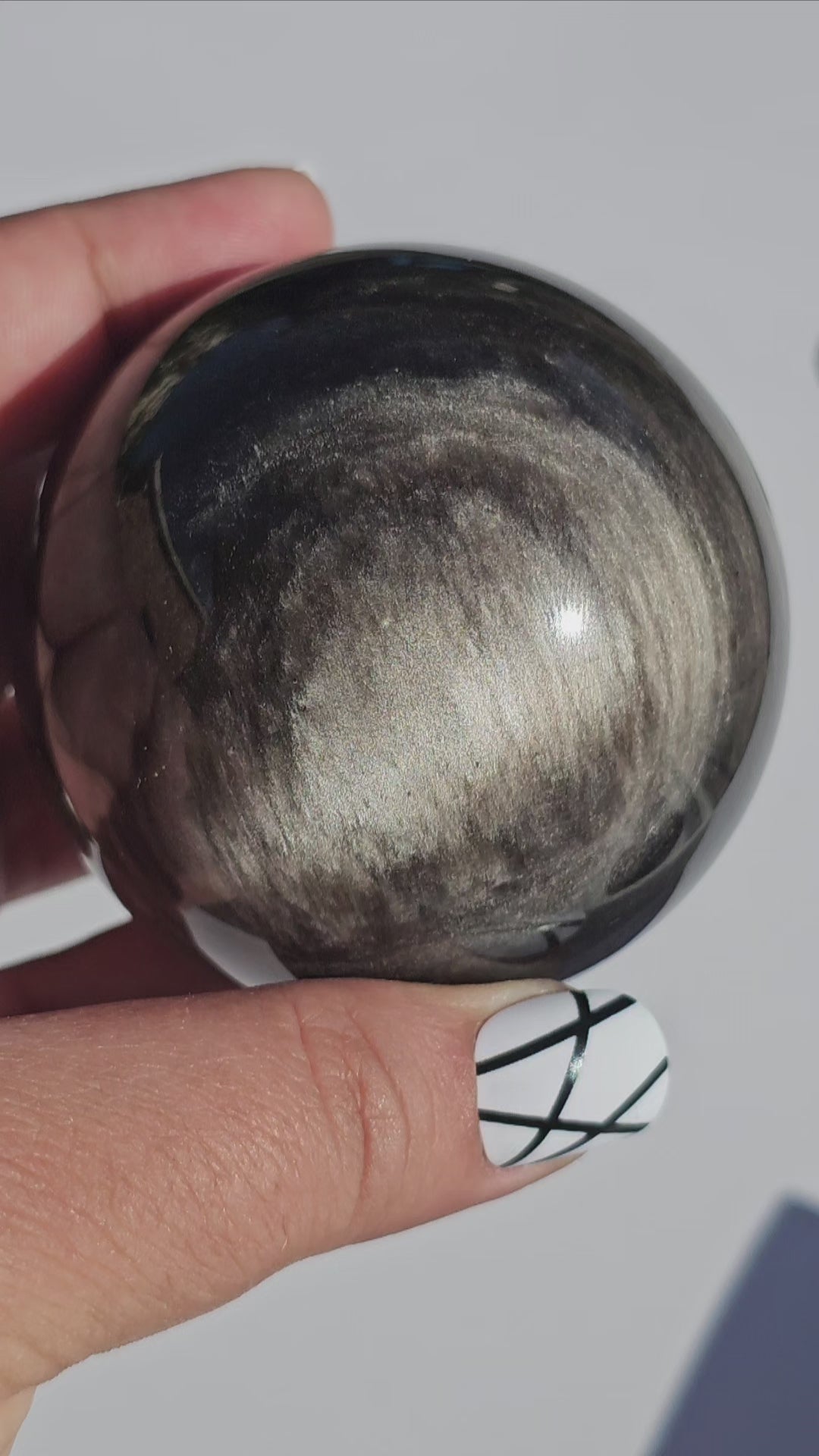 Black Obsidian sphere with an alluring sheen of Silver.