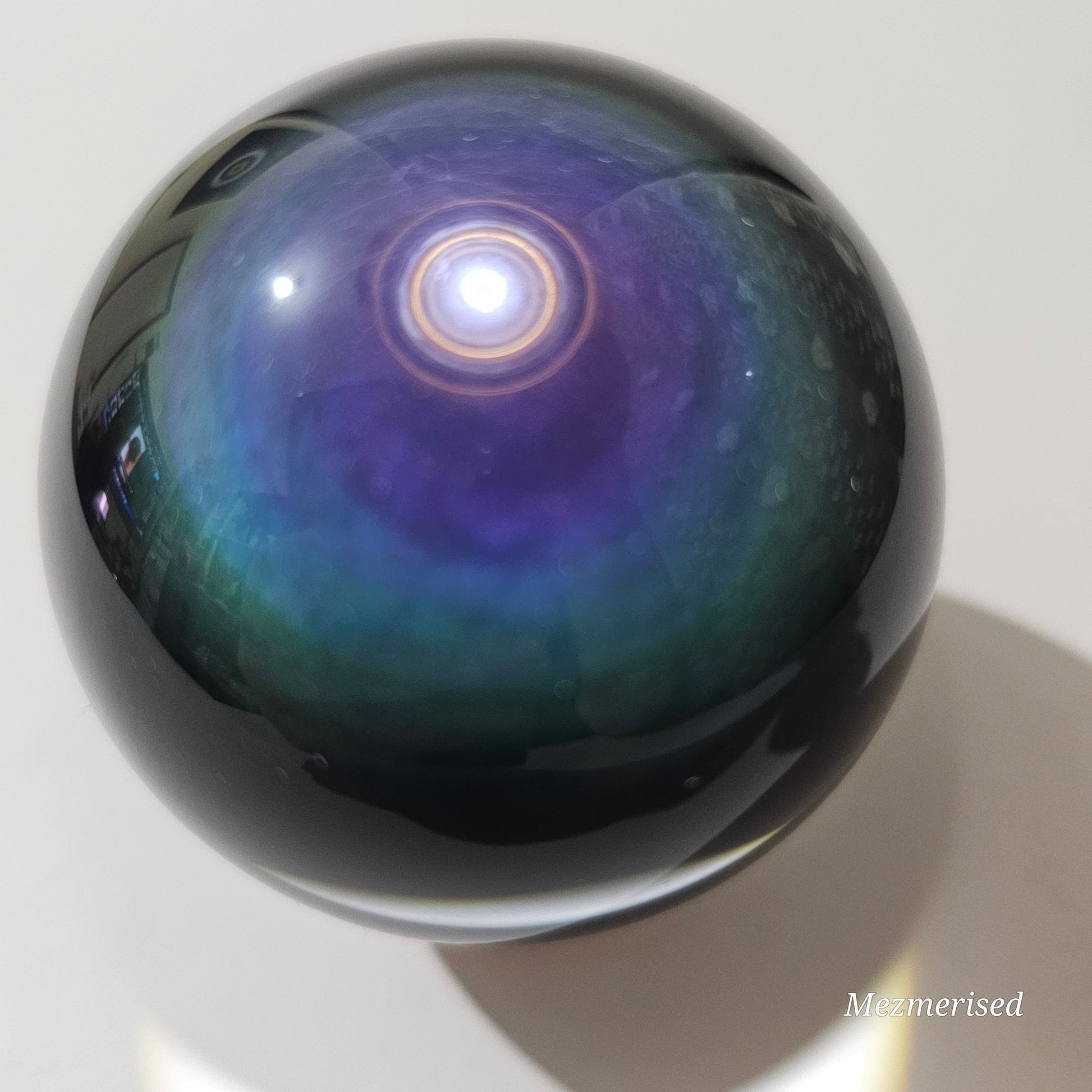 A beautiful Rainbow Obsidian with extraordinary play of colours.