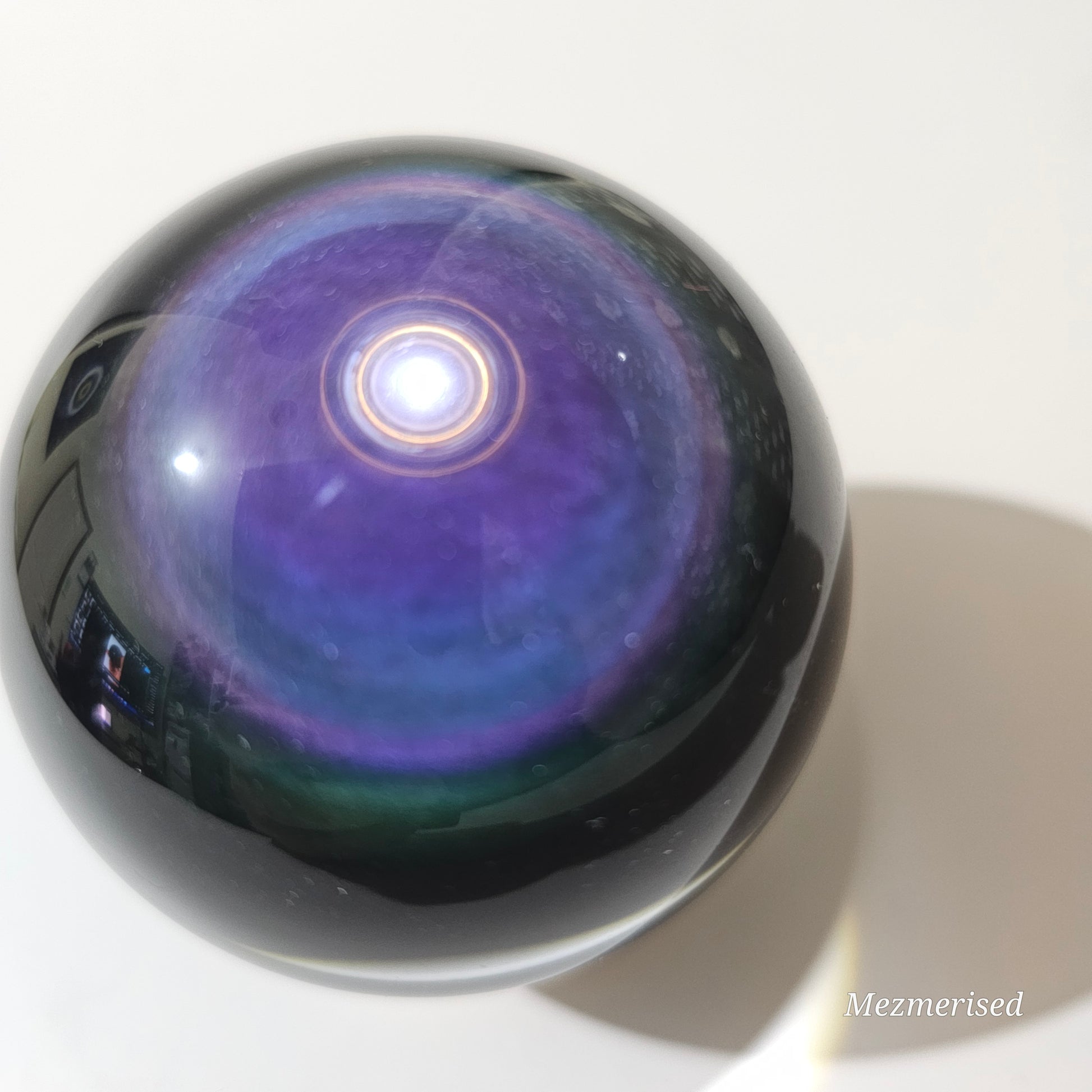 A beautiful Rainbow Obsidian with extraordinary play of colours.