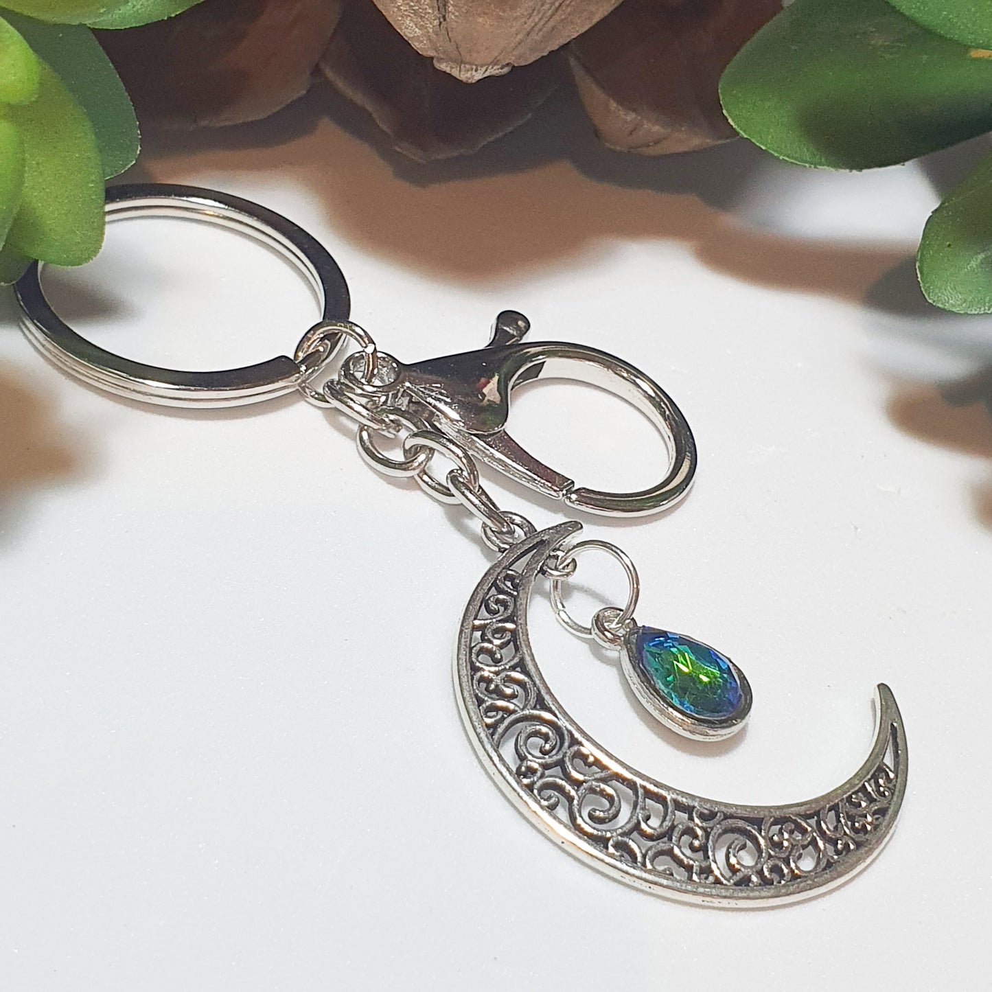 Silver Crescent Keychain with Aurora charm.